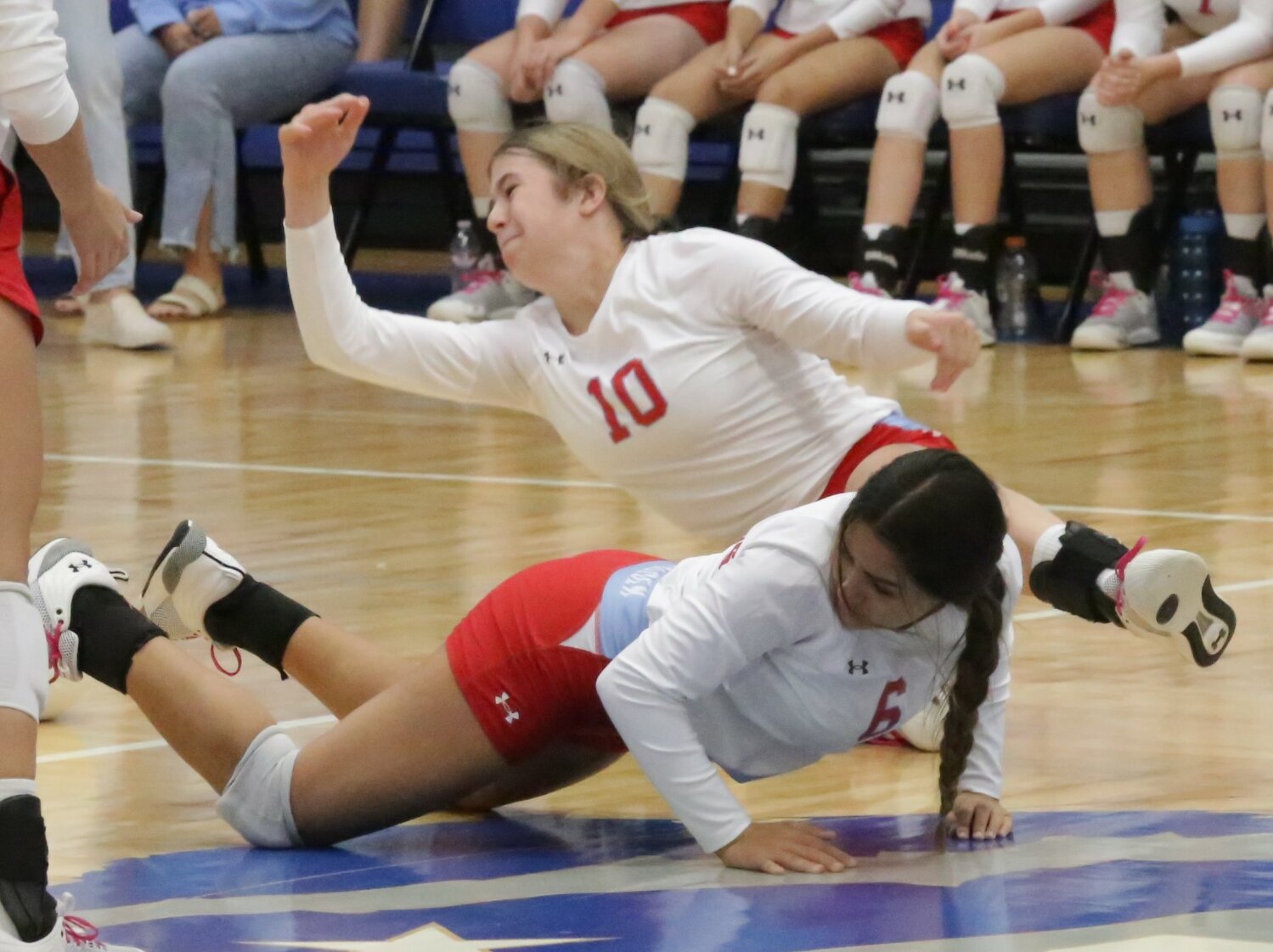 As evidenced by Alba-Golden’s Lainey Teel and Piper Hallman, volleyball is indeed a contact sport. The two compete for a point against the Fruitvale Lady Bobcats.